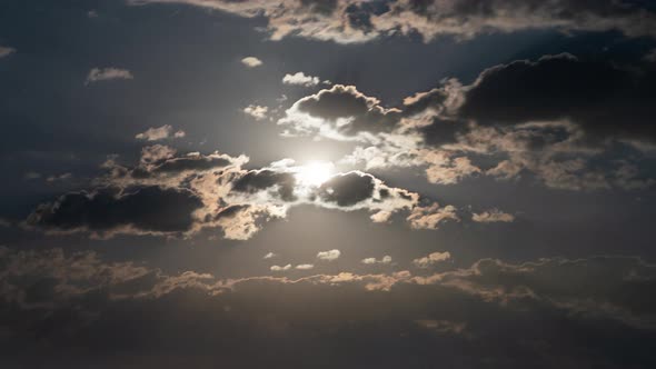 Beautiful Full Moon Sunrise in the Clouds