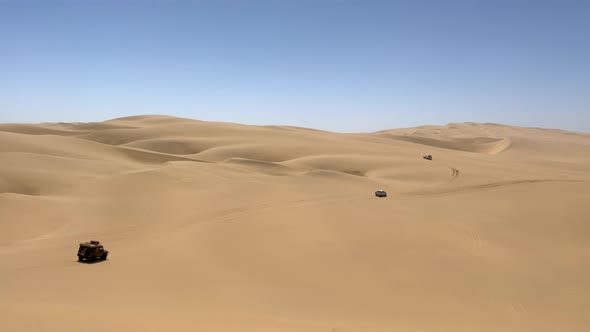 Dune Driving in Desert