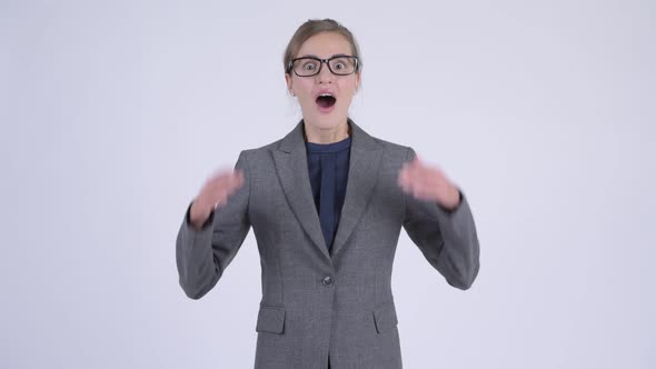 Young Happy Businesswoman Looking Surprised alt
