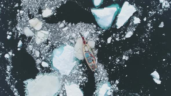 Sailing Yacht Break Through Antarctic Melting Ice