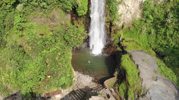 Beautiful Aerial Waterfall with Rocks in a Mountain, top down view