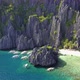 Aerial View of Secret Lagoon with Karst Cliffs and White Beach. El-Nido, Philippines - VideoHive Item for Sale