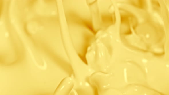 Super Slow Motion Shot of Pouring and Splashing Banana Milk at 1000Fps alt