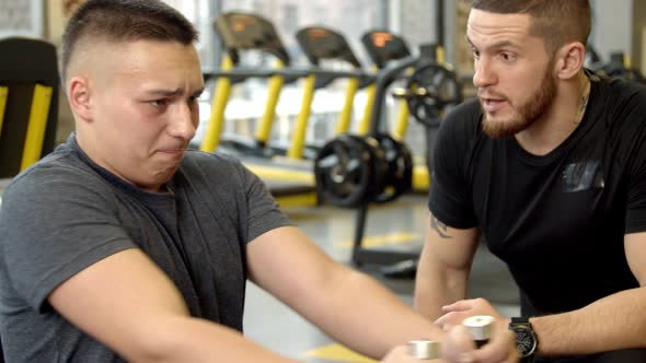 Young Man Shouted at By Instructor While Working Out in Gym