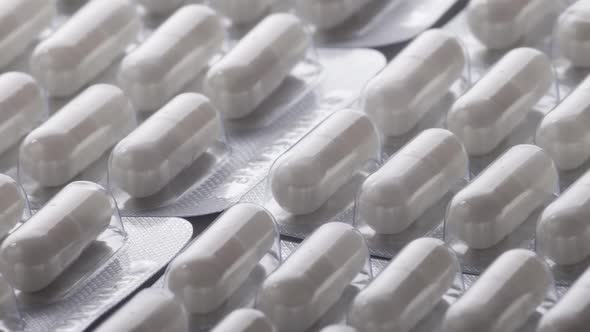 Closeup Shot of Different Pills Falling on Table with Tablets , Pharmaceutical alt
