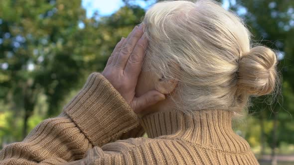 Mature Woman Suffering Migraine Outdoor Massaging Temples, Health Care, Tension