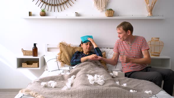 Man Caring for His Sick Wife at Home alt