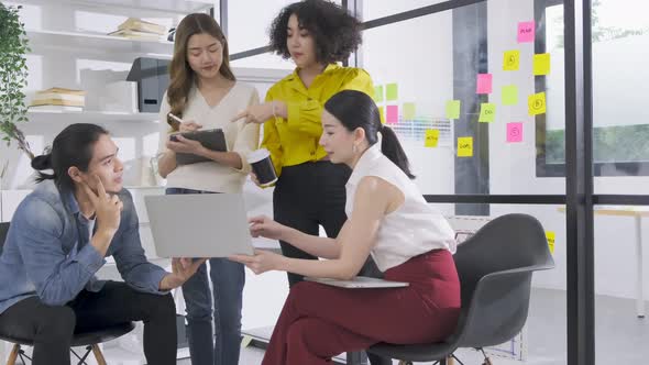 Group of asian young creative happy people entrepreneur on a business meeting office alt