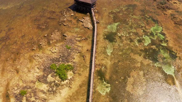 Top View on Wooden Bridge Pier and Viewpoint Cloud 9 Surf Point, Siargao Island, Philippines alt
