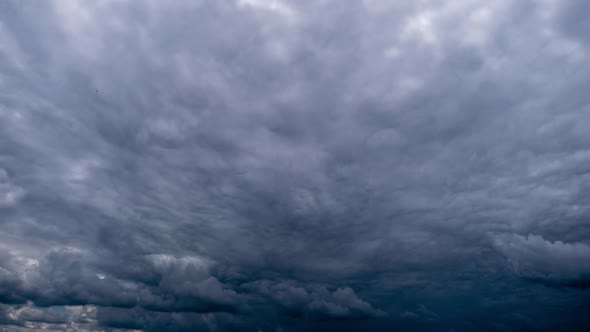 Timelapse of Dramatic Storm Clouds Moving in the Sky alt