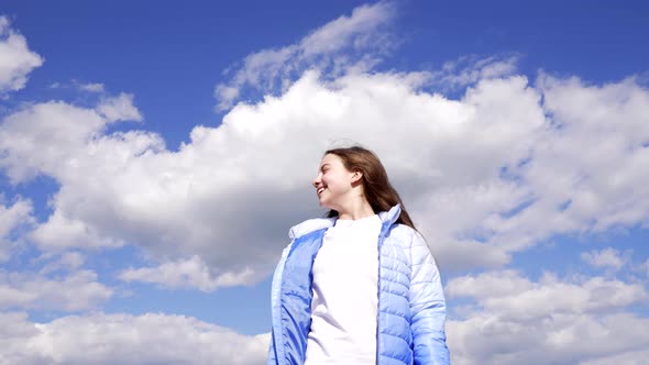 Happy Tween Girl in Autumn Jacket Enjoy the Sun on Sky Background Happiness