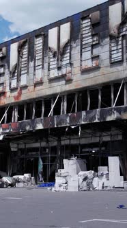 Vertical Video of a Bombed Shopping Center During the War in Bucha Ukraine alt