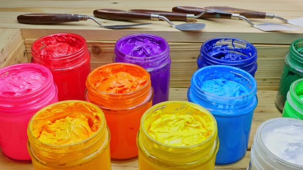 Serveral Paints In Tranparant Bottles . alt