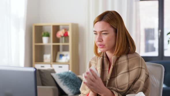 Sick Woman Having Video Call on Laptop at Home alt