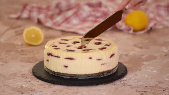 Pastry Chef Cuts Cherry Cheesecake
