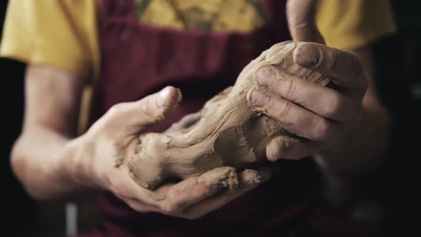 Serious Woman Working at Pottery Wheel in Studio Prepare Clay to Make Plate to Restaurant alt