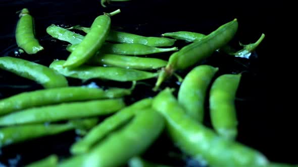 Falling of Green Peas in Water alt