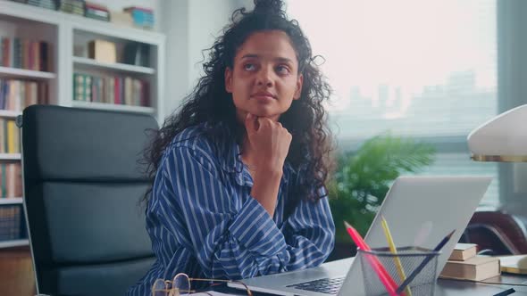 Young Ethnic Indian Woman Unable to Concentrate Working or Studying on Laptop alt
