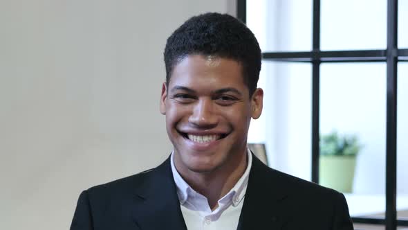 Amazed, Surprised Black Businessman alt