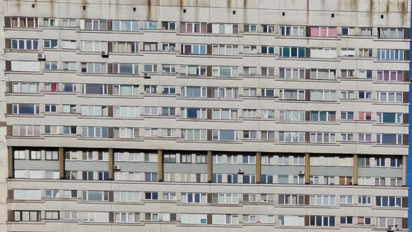 Gloomy Facade of an Old Building of a Residential Building of the Soviet Union an Array of Windows a alt