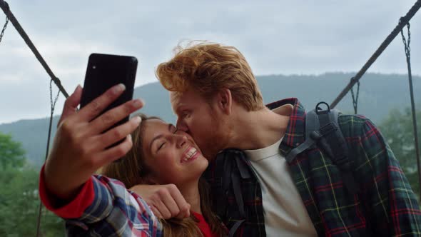 Fun Lovers Make Photo on Smartphone Selfie Travel Blog alt