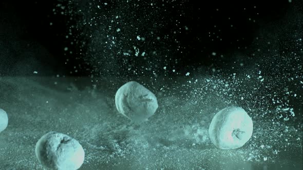 Doughnuts falling and bouncing in ultra slow mo 1500fps - reflective surface - DOUGHNUTS PHANTOM 006 alt