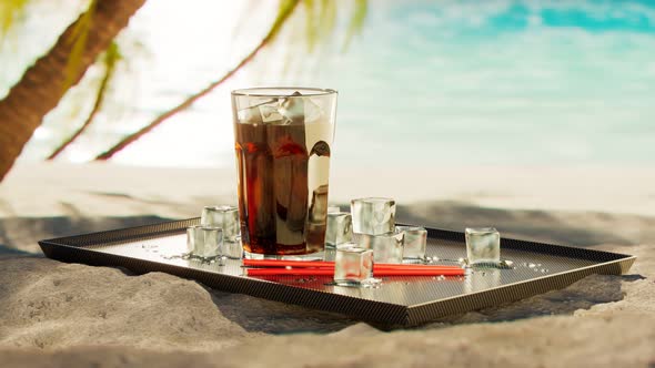 A nice glass of ice-cold cola. Drink at the beach cocktail bar. Soda on a tray. alt