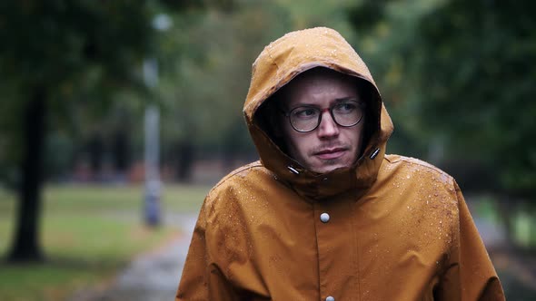 Man In Waterproof Jacket During Rain
