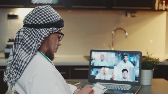 Arabic Doctor Participating in International Conference on Healthcare Issues By Video Call