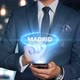 Businessman Smartphone Hologram Word Country   Capital  Madrid - VideoHive Item for Sale