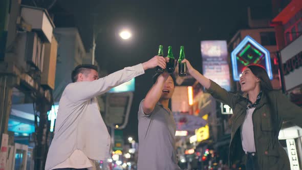 Asian attractive people drinking alcohol with friends and having party. alt