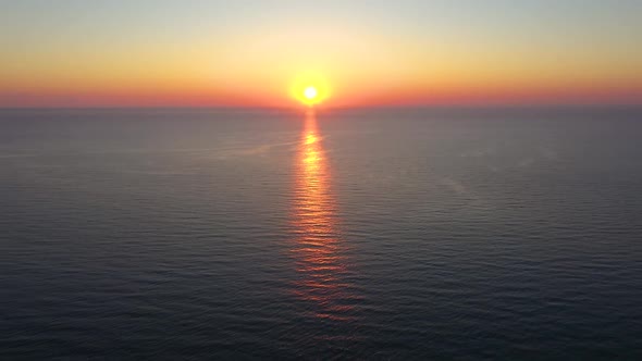 Aerial view to beautiful sunrise over the sea