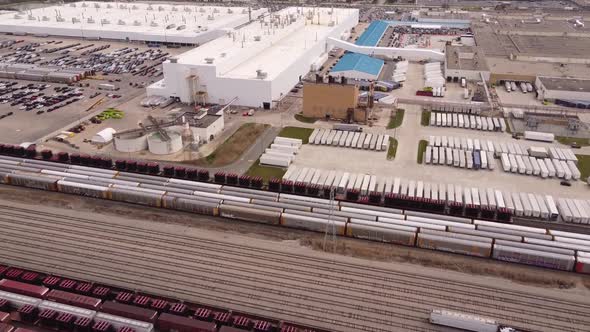 Lorry Truck Driving At The Premises Of FCA Stellantis Assembly Plant In An Industrial Park In Sterli alt