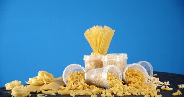 A Variety of Types of Pasta Dry on the Table Slowly Rotates.  alt