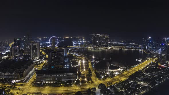 Aerial time lapse of the Marina Bay area during sunrise 