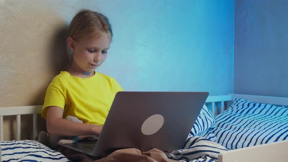 Girl Uses Laptop Gadget
