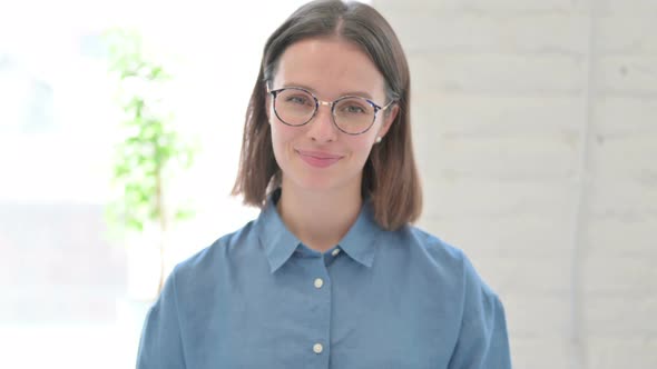 Agree Woman Shaking Head as Yes Sign alt