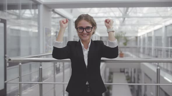 Happy Excited Woman Celebrating Triumph alt