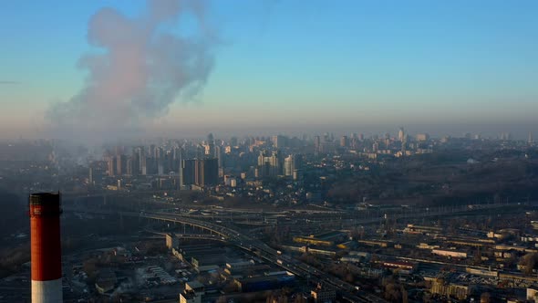 Chimneys of an Industrial Enterprise Top View at Sunset Time alt