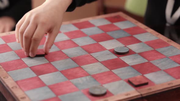 Children Play Checkers alt