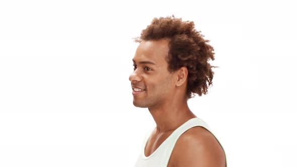 Handsome African Man Smiling Showing Okay Over White Background alt
