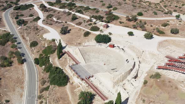 Flight of a Drone Over the Ruins of an Old Historic Ancient Amphitheater alt