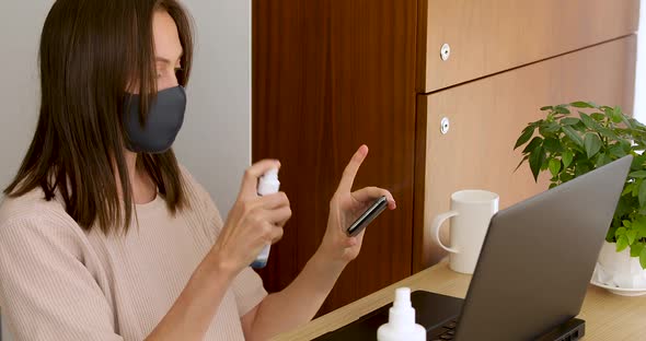 Woman in Mask Disinfection Smartphone alt