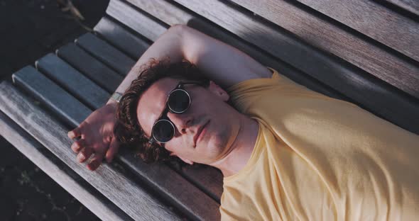 Man opens fun flip up glasses alt