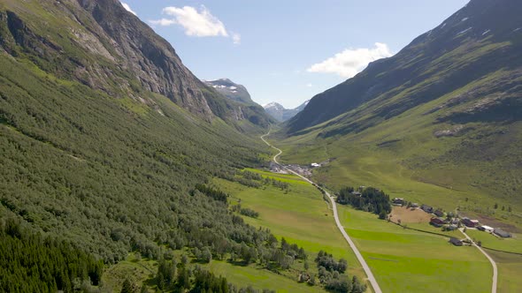 Secluded mountain village of Aarset in Geiranger fjord, Norway; aerial view alt