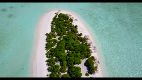 Aerial flying over abstract of tropical coast beach break by transparent lagoon with white sandy bac alt