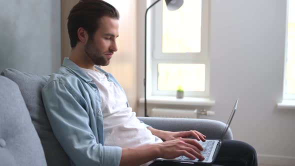 Male Freelancer Enjoying Online Work