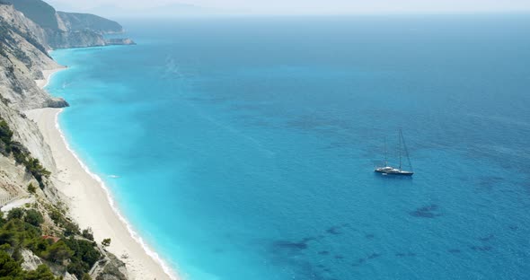 Luxury Sail Yacht Boat in Turquoise Blue Sea Lagoon Near Egremni Beach Lefkada Island Greece alt