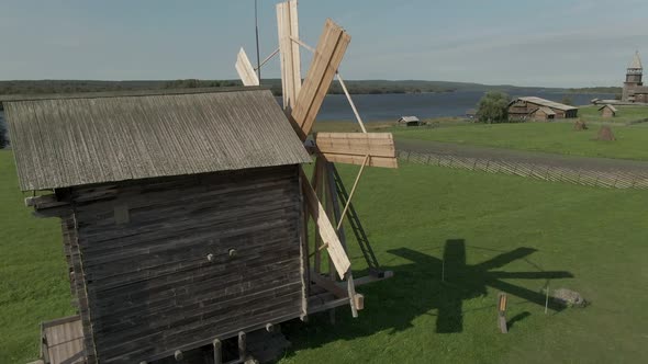 a Cinematic Shot From the Air Around the Wooden Walkway of Kizhi alt