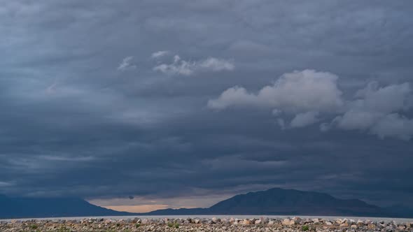 Dark clouds following a rainstorm moving over Utah Lake alt